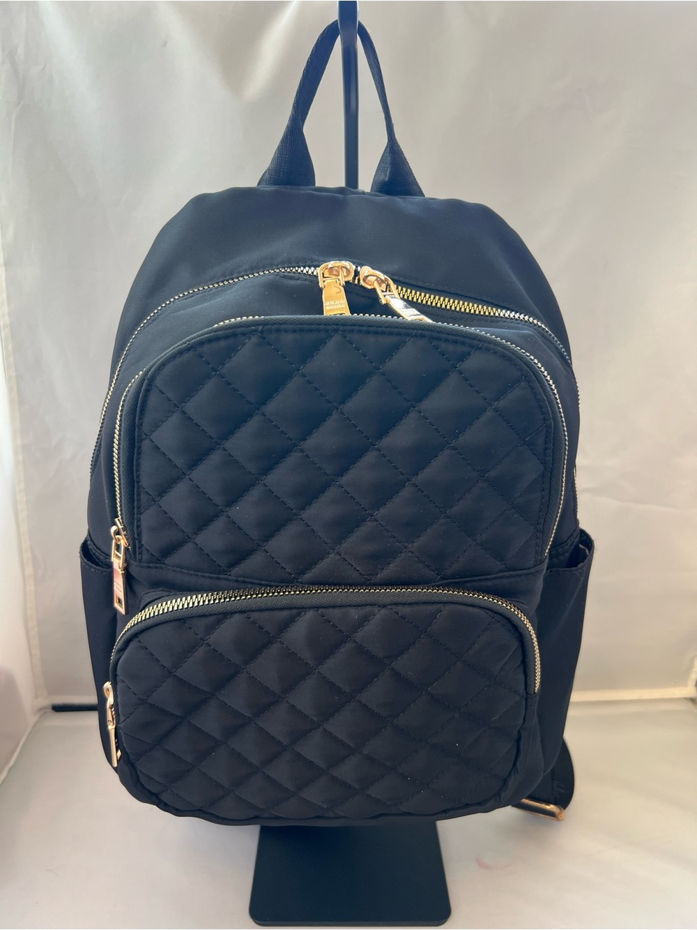 Quilted Black Backpack with Gold Hardware